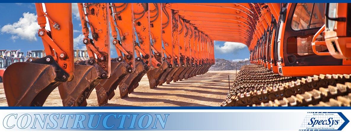 Construction - SpecSys, Inc - Photo of Excavators lined up in a row